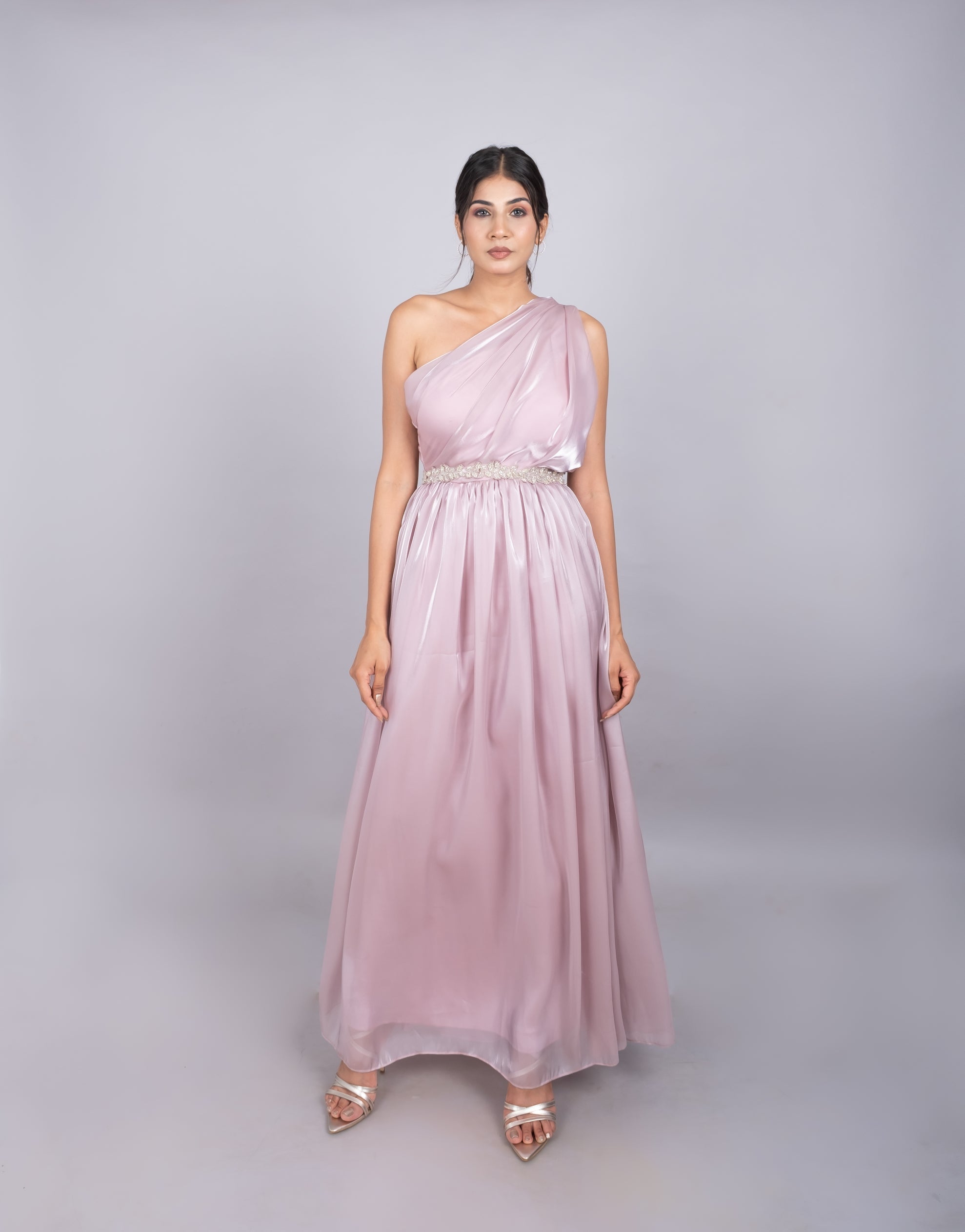 One shoulder gown in soft pink.