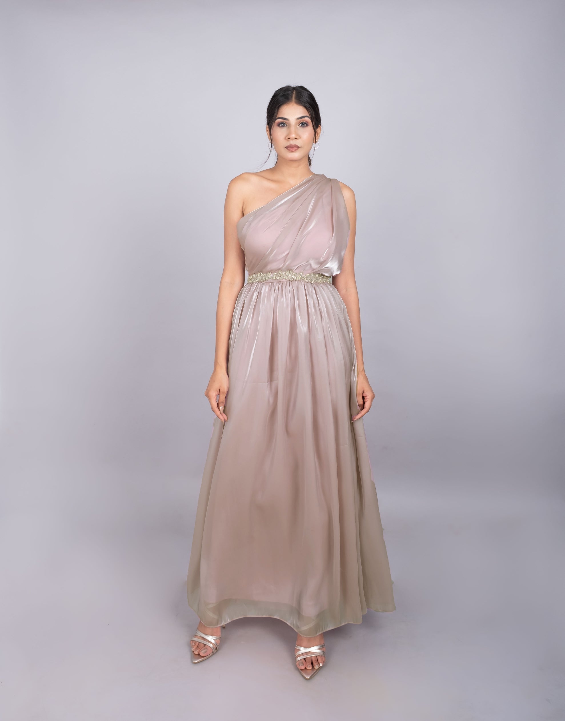 One shoulder gown in soft pink.